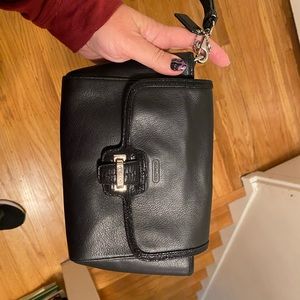 Coach larger black leather wristlet, great used condition. Shiny edge detail.